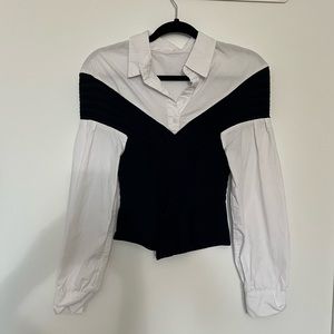 White button down with attached sweater vest